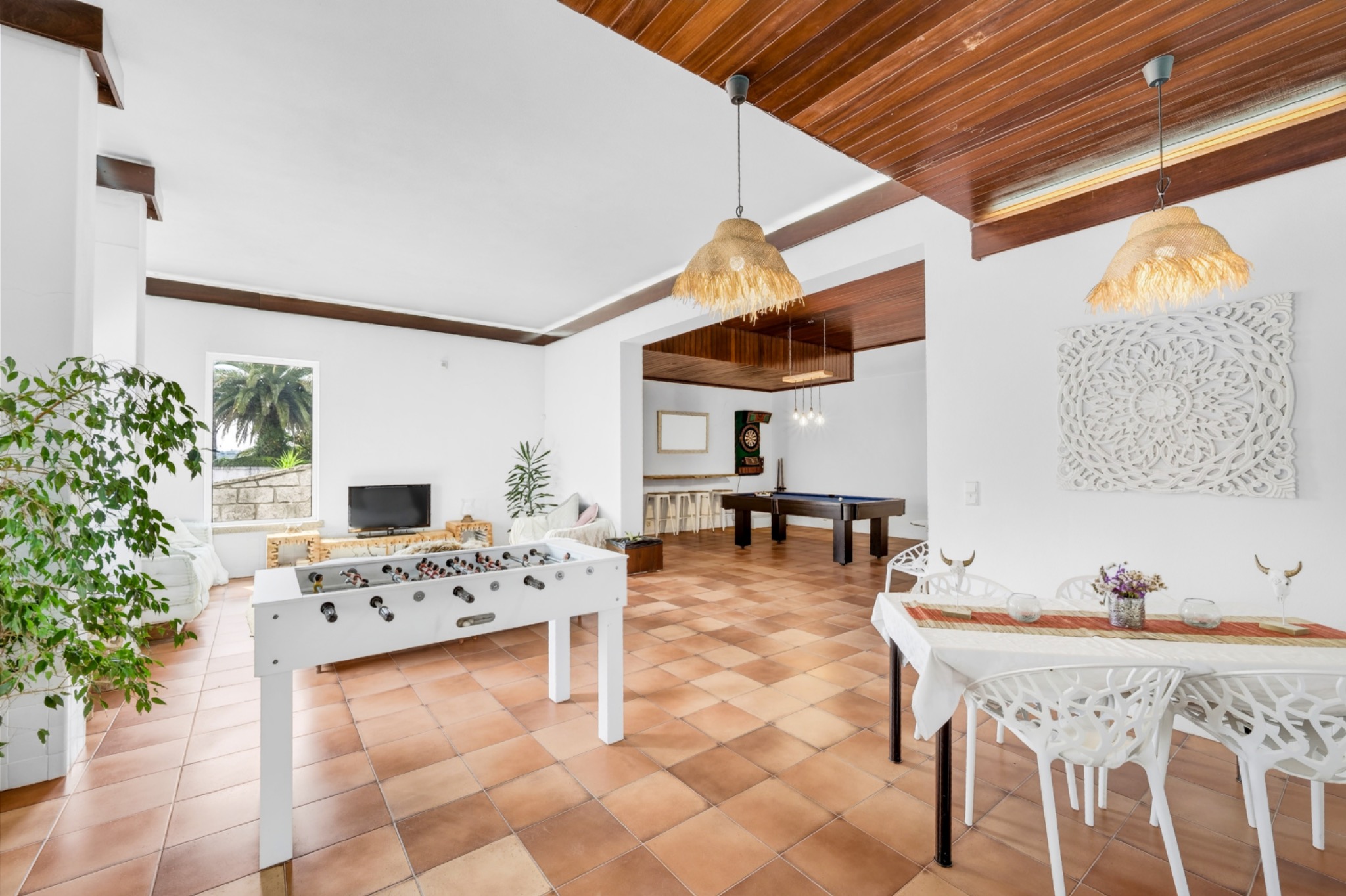 Retreat property communal games room with pool and foosball tables